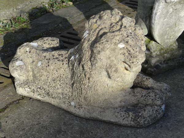 Garden and architectural : an old  composite stone figure of a couchant lion. Has two fixing holes - Image 3 of 6