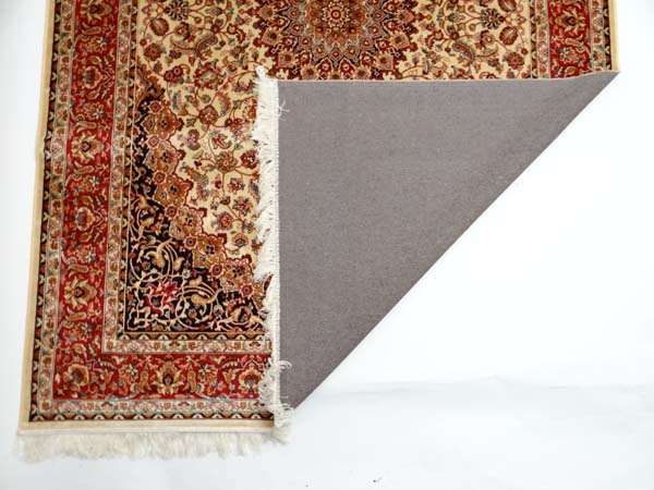 Carpet / rug :  a Keshan carpet with beige ground , black, red, and dark mustard colours , 95"x 62" - Image 2 of 3