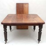 A 19thC mahogany wind out dining table with additional leaf ( extending to 66" x 44")  CONDITION: