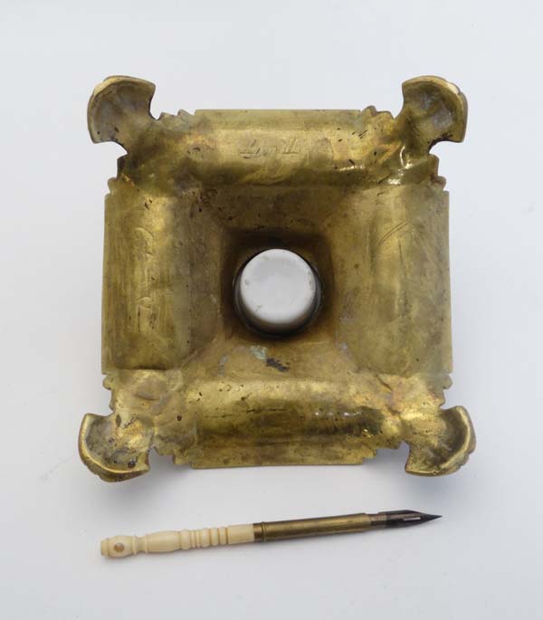 A Victorian cast brass inkwell / Standish of squared form with relief decoration having hinged - Image 2 of 7
