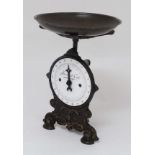 Scales : A French decorative cast iron and enamel faced set of scales marked 'house hold scale  up