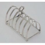 A regent plate 7-bar toast rack marked ' The Goldsmiths & Silversmiths Company Ltd 112 Regent St W '