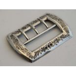 A Victorian silver buckle with floral, foliate and acanthus scroll engraved decoration. Hallmarked