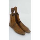 A pair of Victorian shaped beech foot / shoe lasts . Approx 9 1/2" high  CONDITION: Please Note -
