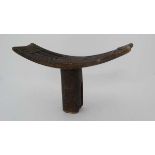 Native Tribal : an African stool with mono foot  and decorated with brass studs and carved