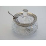 A cut glass preserve pot with silver rim hallmarked London 1928 maker Henry Perkins & Sons. With