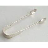 Victorian silver fiddle pattern sugar tongs hallmarked London 1842 maker William Eaton . Approx 5"