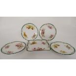 A set of four 'Royal Doulton Plates and a sweet meat dish in the ''orchid '' pattern. Green