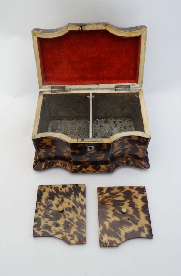 An early 19thC blonde tortoiseshell tea caddy  with cupids bow shaped front , the lid opening to - Image 2 of 7