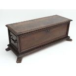 A 19thC Italian Cassone , the walnut coffer  of peg construction with hand made nails and having