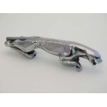 Jaguar car bonnet mascot : A chromed car mascot formed as a leaping jaguar. Approx 7" long