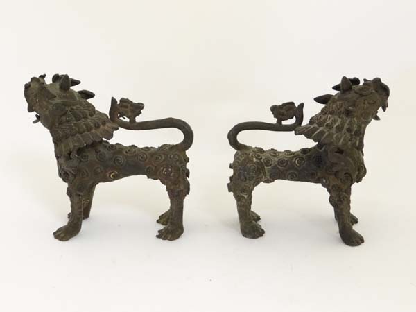 A pair of bronze Vyala, Nepal , 19th / 20th century, Their fanged mouths open, the bodies with swirl - Image 10 of 12