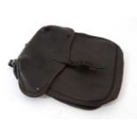 Hunting : A leather saddle bag with two strap fixings verso and buckle catch to front. 9 3/4 x 10