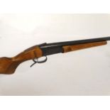 Shotgun : A Baikal , Russia IJ18M 20 bore single barrel shotgun , 15 1/4" chequred pistol grip beech