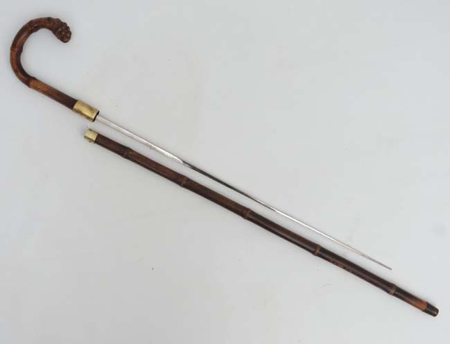 Collectors Antique Sword Stick : a bamboo and brass Crook handled 19 th C Sword Stick with squared