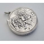 Golfing Interest : A novelty silver vesta case of circular form  depicting images of golfers. Having