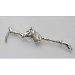 A silver bar brooch / stock pin formed as a riding crop with horse head to centre .  2 1/2" wide