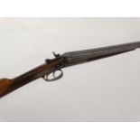 Shotgun : A Belgian .410 back - action toplever hammergun , 15 1/4" chequered straight hand beech