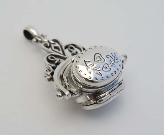 A 925 silver pendant formed fob seal with central rotating section with hinged locket - Image 6 of 10