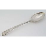 A Geo III silver table spoon with bright cut decoration. Hallmarked Exeter 1784 maker Joseph Hicks