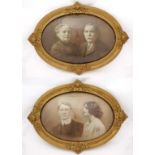 A pair of convex glass gilt framed monochrome photographs of Edwardian figures , the border with