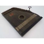 Music: A Zither signed Lyra - Adler Guitarr-Zither with 90 strings on an ebonised base, 19 3/4" long