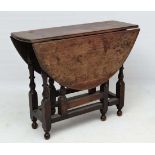 A late 17thC / early 18thC  small proportion oak oval gate leg table with drawer to one end having