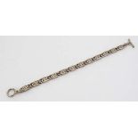 A Mexican .925 silver bracelet approx 7" long  CONDITION: Please Note -  we do not make reference to