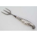 A silver handled bread fork. Hallmarked Birmingham 1901 maker Jones & Crompton 7 3/4" long