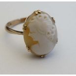 A 9ct gold ring set with classical cameo to top  CONDITION: Please Note -  we do not make