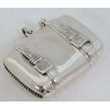 A modern novelty silver vesta formed  as a suitcase with hinged lid and striker under. 1 3/4"