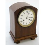 8 day  Walnut Mantel Clock : with white enamel 4 1/4" dial having minute markers and Roman Numeral
