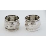 A pair of silver napkin rings of octagonal form. Hallmarked Chester 1919 maker James Deakin &