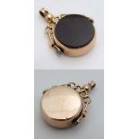 A 9ct pendant fob seal : an A&C .375 gold revolving seal with gold and cornelian stone united by a