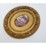18thC - 19thC Convex Enamel on Copper : a gilt framed oval coloured enamel , with scene after