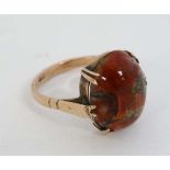 A 9ct gold ring set with moss agate cabochon to top  CONDITION: Please Note -  we do not make