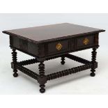 An early 18thC Indo-Portuguese hardwood low table with single ( as two) drawer to frieze with bobbin