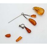 A quantity of amber jewellery including brooch, pendant etc

 CONDITION: Please Note -  we do not