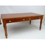 A 19thC pitch pine kitchen table with 3 drawers to sides and four turned legs 39 1/2" wide x 72"