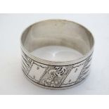 5 various silver plate napkin rings together with a .800 German silver napkin ring (6) CONDITION: