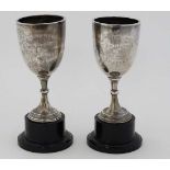 A pair of silver trophy cups engraved ' St Albans Lawn Tennis Charity Assocn.....' hallmarked