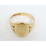 An 18ct gold signet ring (8g) CONDITION: Please Note -  we do not make reference to the condition of