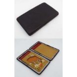 Edwardian leather card case with embroidered kid and silk lined interior  having compartment etc.