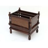 An early - mid 19thC Rosewood Canterbury having 3-divisions to top and  concave moulded frieze