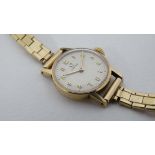 9ct Omega  : a Ladies 9. 375 mechanical gold case and expandable strap Omega wristwatch having a