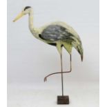 Folkart : a moulded metal hand painted figure of a heron mounted upon a squared block, standing 41