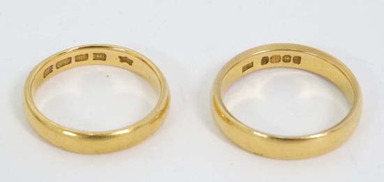Two 22 ct gold wedding bands (12g) CONDITION: Please Note -  we do not make reference to the