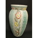 A large HJ Wood Burslem handpainted vase. Decorated with red and yellow poppies on a turquoise and