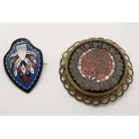 2 gilt metal brooches with enamel decoration one with Persian like script. The largest 2" diameter