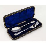 A cased silver Christening set comprising spoon and fork hallmarked  Sheffield 19063 maker Robert